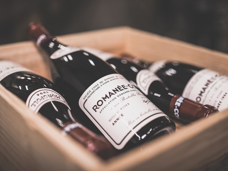 wooden box with bottles of romanee-conti